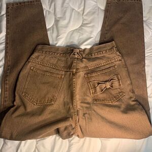 Y2K International Brown Jeans Waist 24 By 28 inseam Bow tie back pocket design